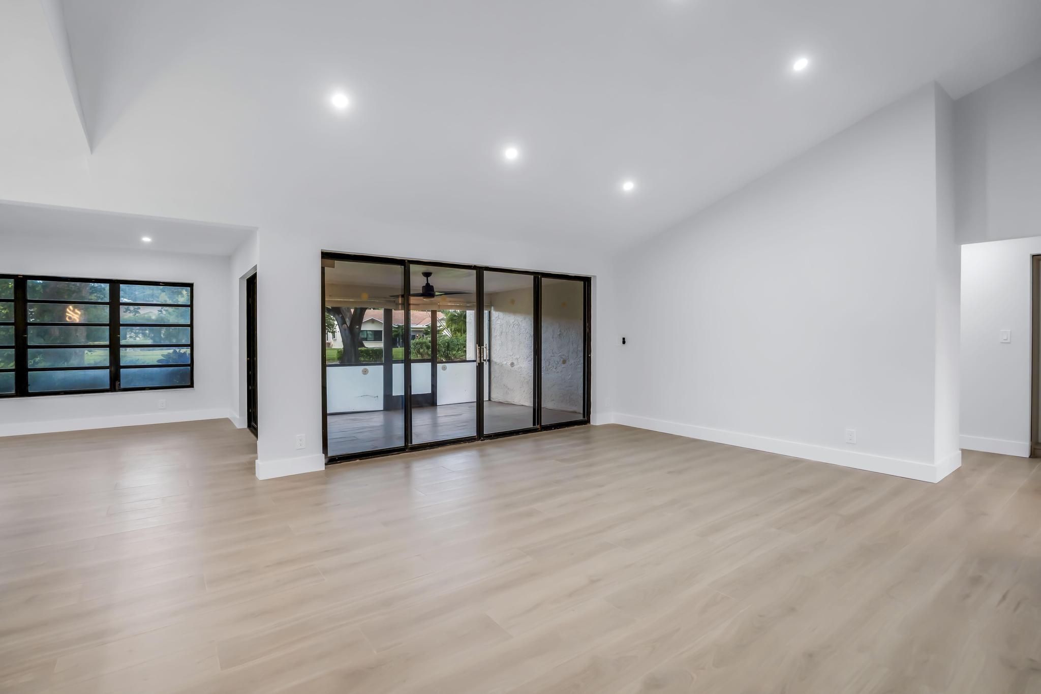 18089 103rd Trail South Boca Raton, FL 33498 - Photo 21 of 51 a view of an empty room with glass door