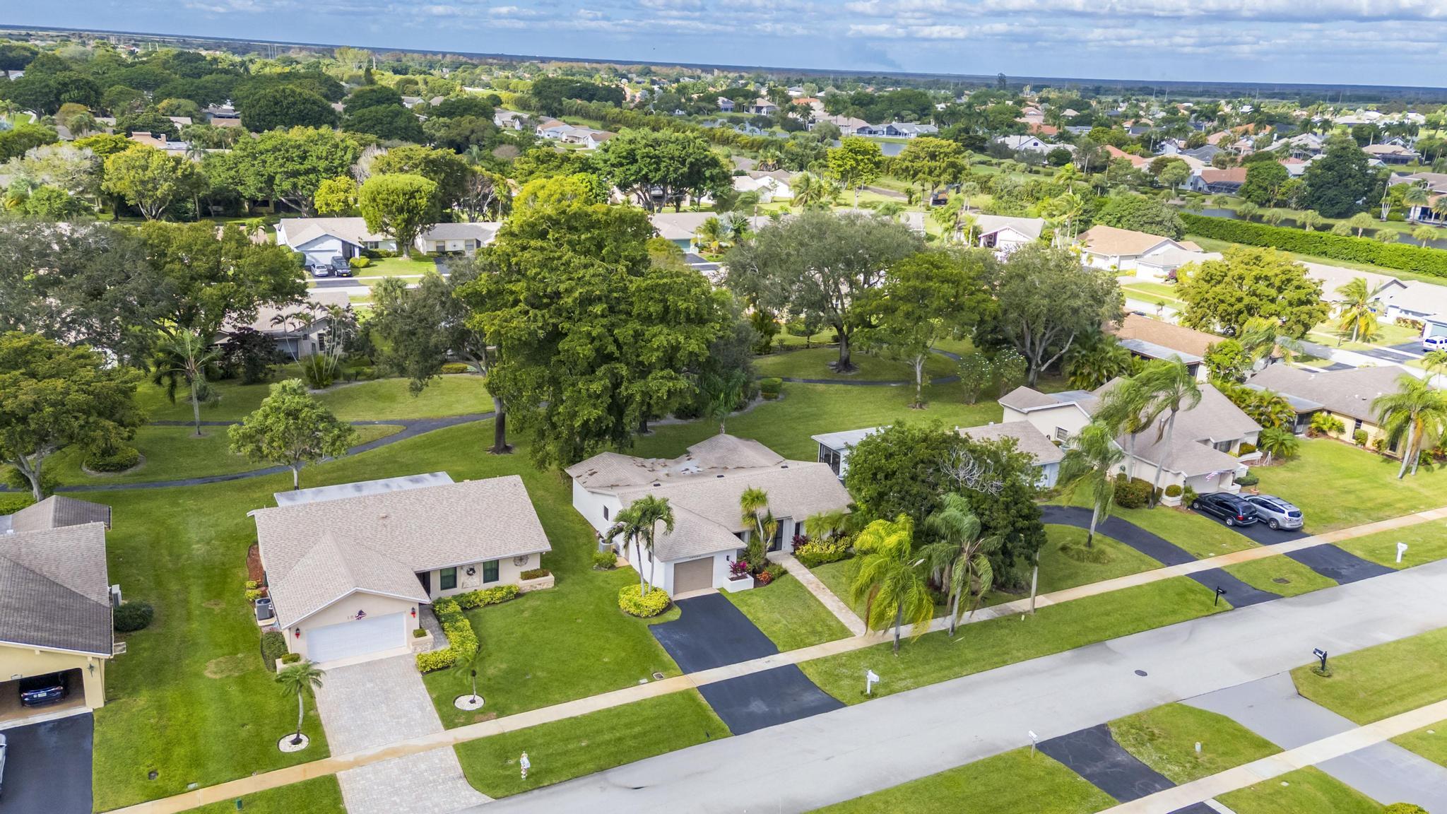 18089 103rd Trail South Boca Raton, FL 33498 - Photo 38 of 51 an aerial view of residential houses with outdoor space and street view