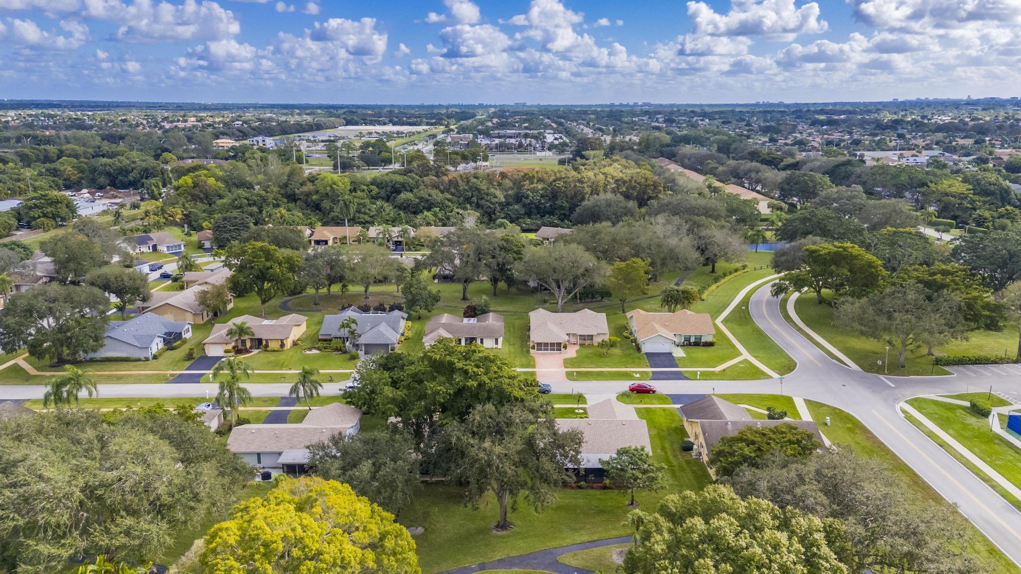 18089 103rd Trail South Boca Raton, FL 33498 - Photo 40 of 51 an aerial view of residential house with outdoor space and a lake view