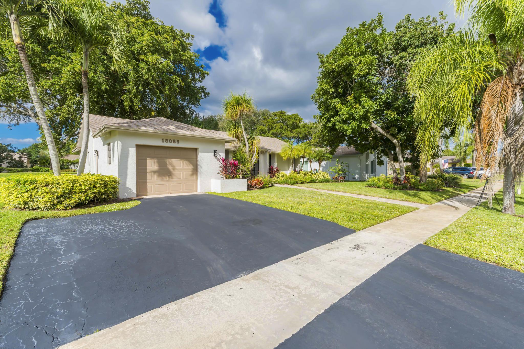 18089 103rd Trail South Boca Raton, FL 33498 - Photo 48 of 51 a view of a house with a yard