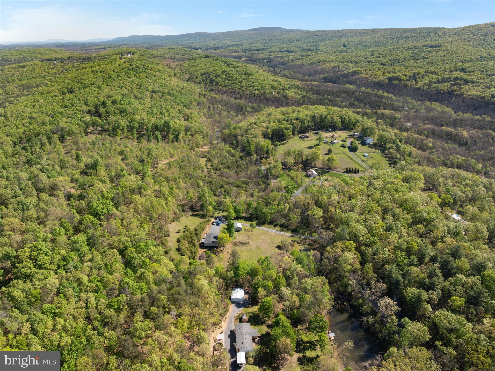 775 Pack Horse Road Winchester, VA 22603 - Photo 18 of 28 a view of a big yard with lots of bushes