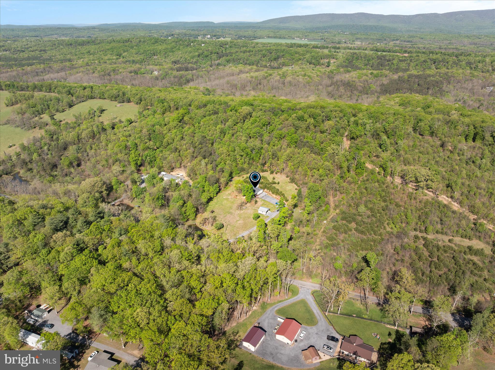 775 Pack Horse Road Winchester, VA 22603 - Photo 20 of 28 a view of a lake with a mountain