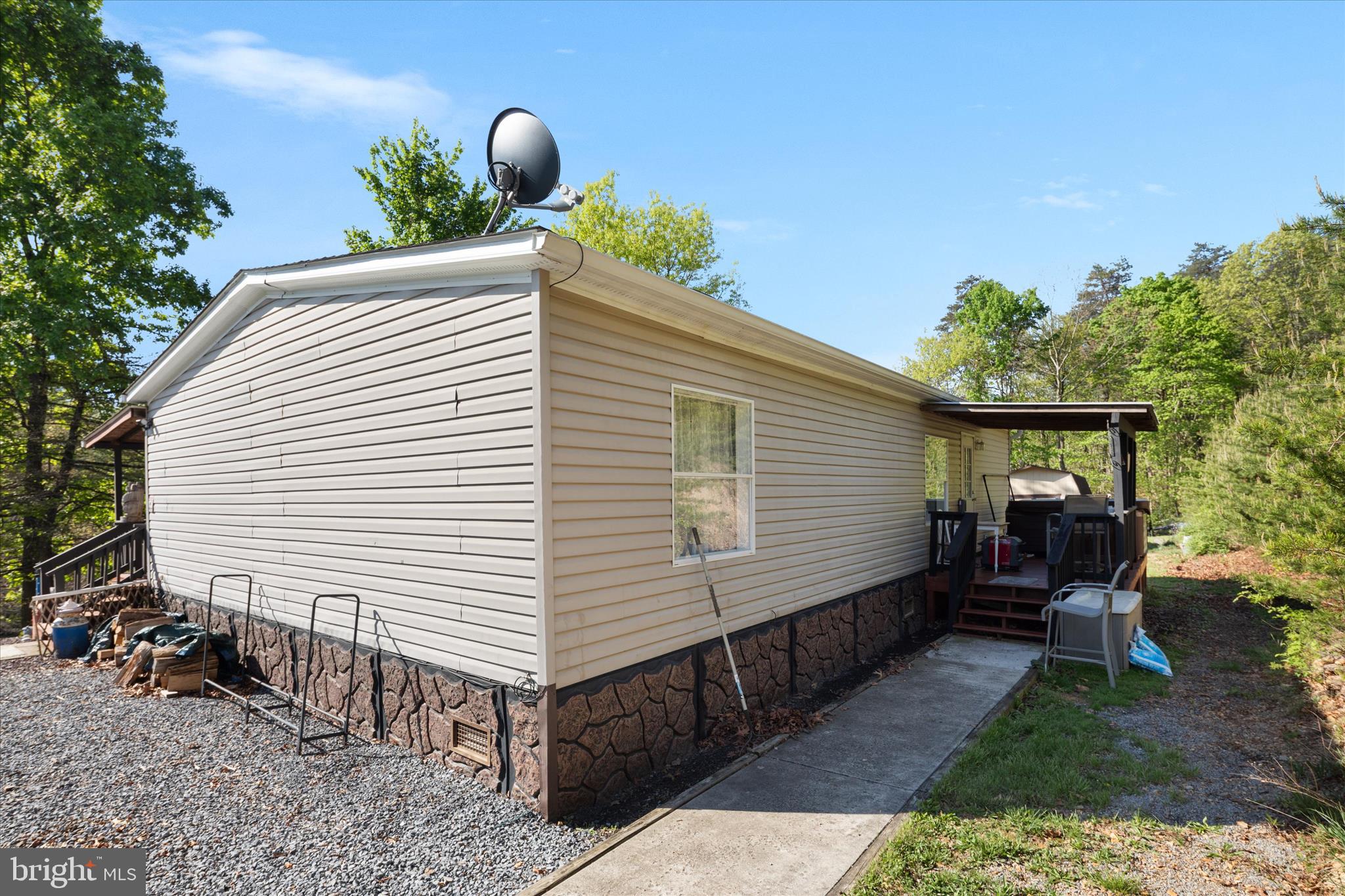 775 Pack Horse Road Winchester, VA 22603 - Photo 6 of 28 a view of a house with backyard and sitting area