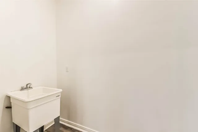 a utility room with a sink