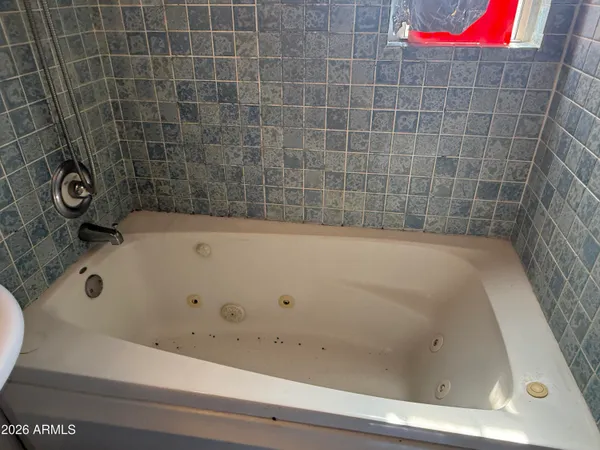 a bathroom with a bathtub