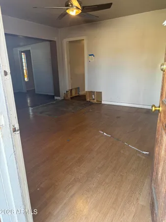 an empty room with a mirror