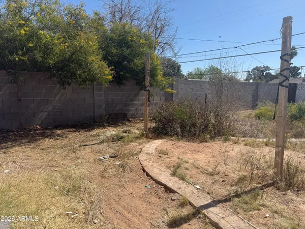 a view of a backyard of a house