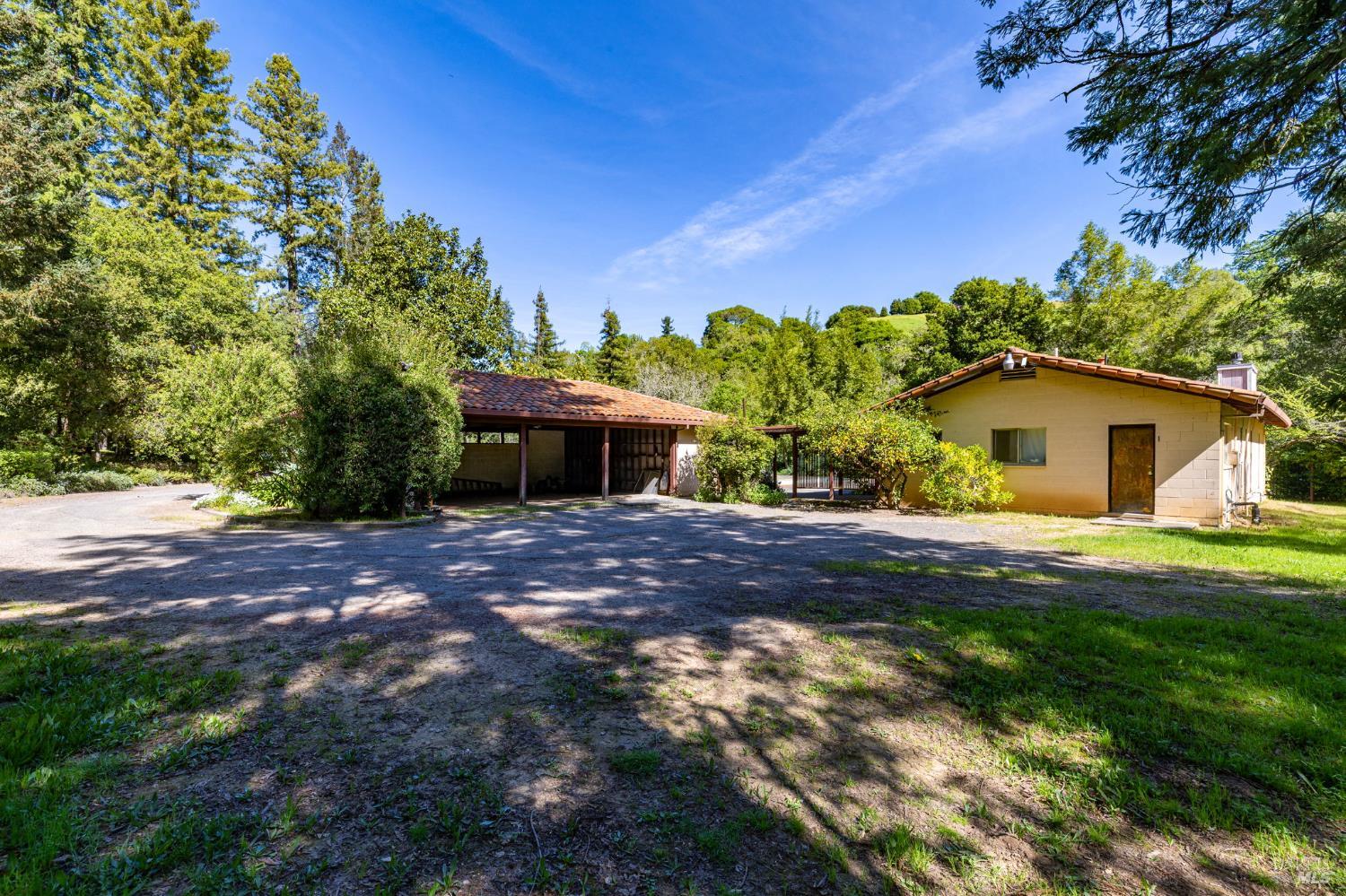 3320 Redwood Road Napa, CA 94558 - Photo 11 of 57 a front view of a house with garden