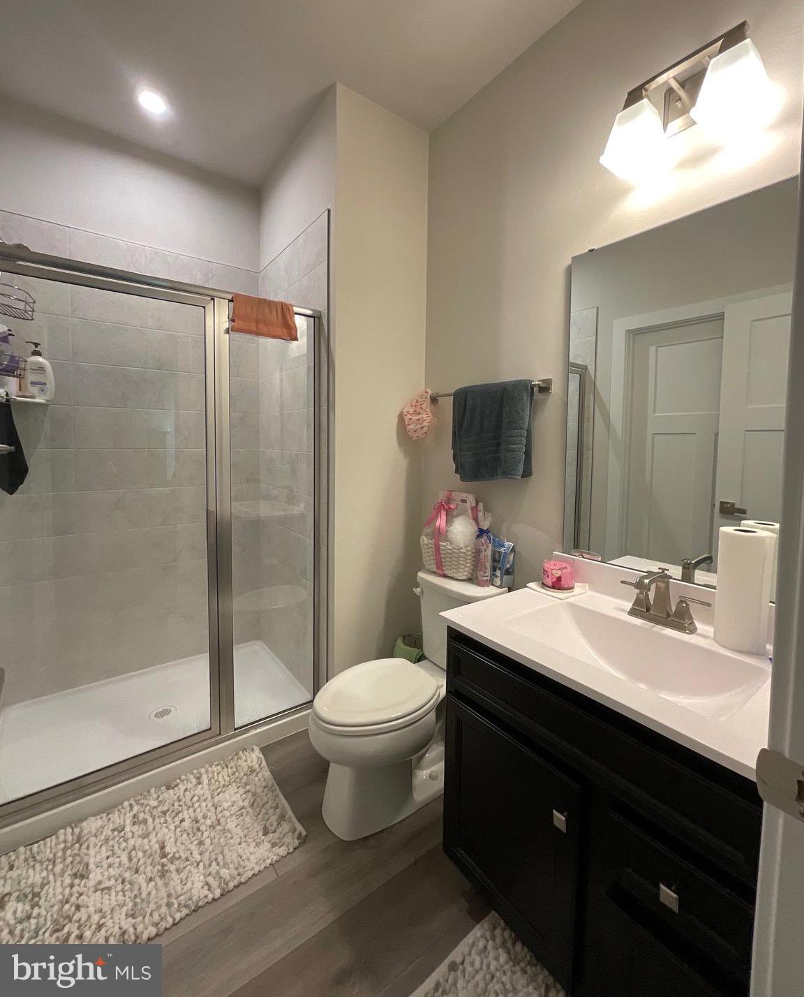 14724 Silver Hammer Way Brandywine, MD 20613 - Photo 2 of 5 a bathroom with a sink and a mirror