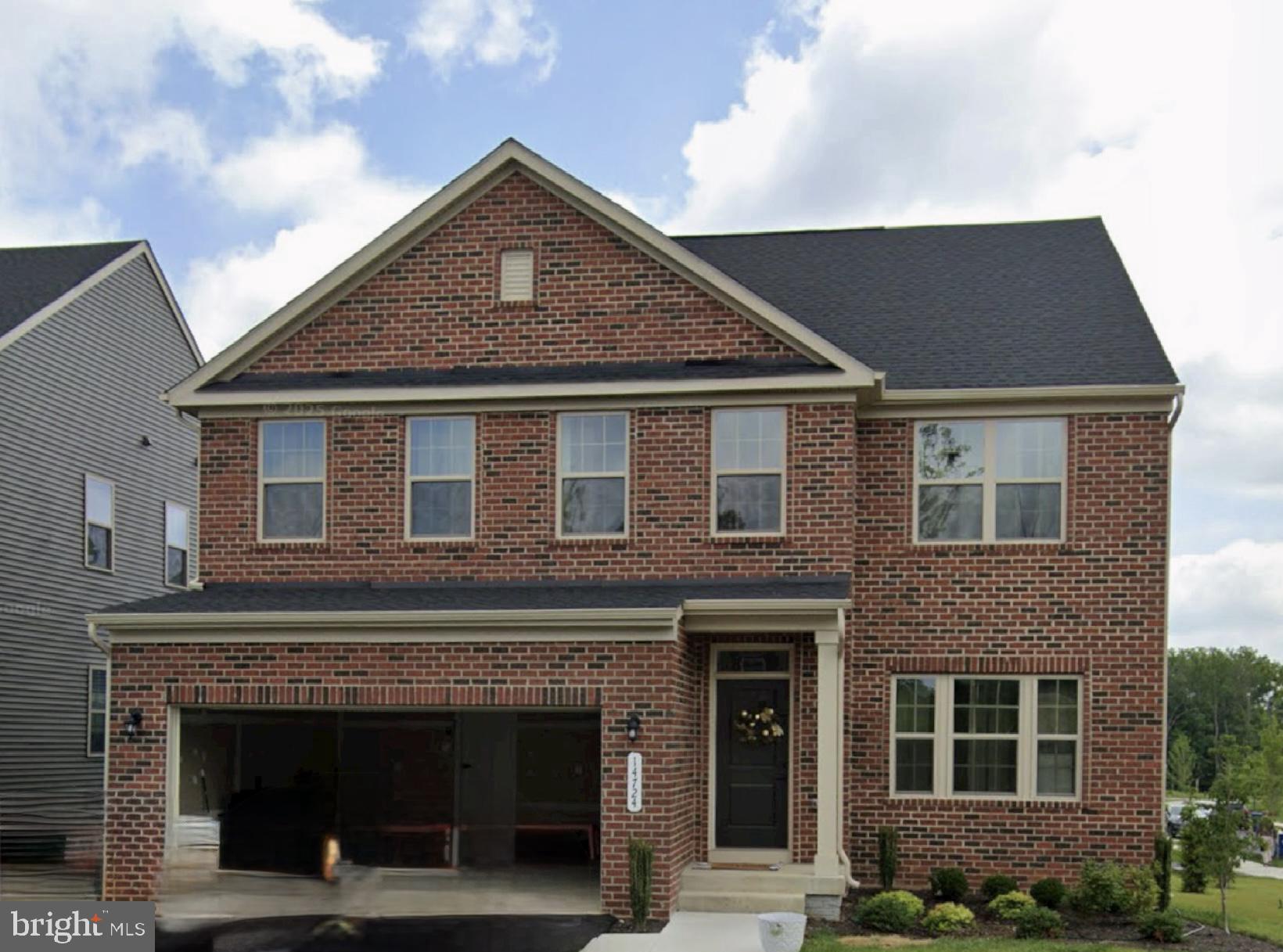 14724 Silver Hammer Way Brandywine, MD 20613 - Photo 5 of 5 a front view of a house with garden