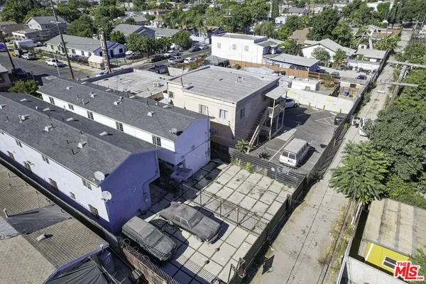 an aerial view of a house with a garden