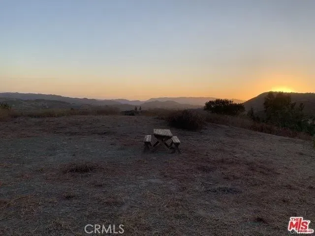 a view of outdoor space with mountain view