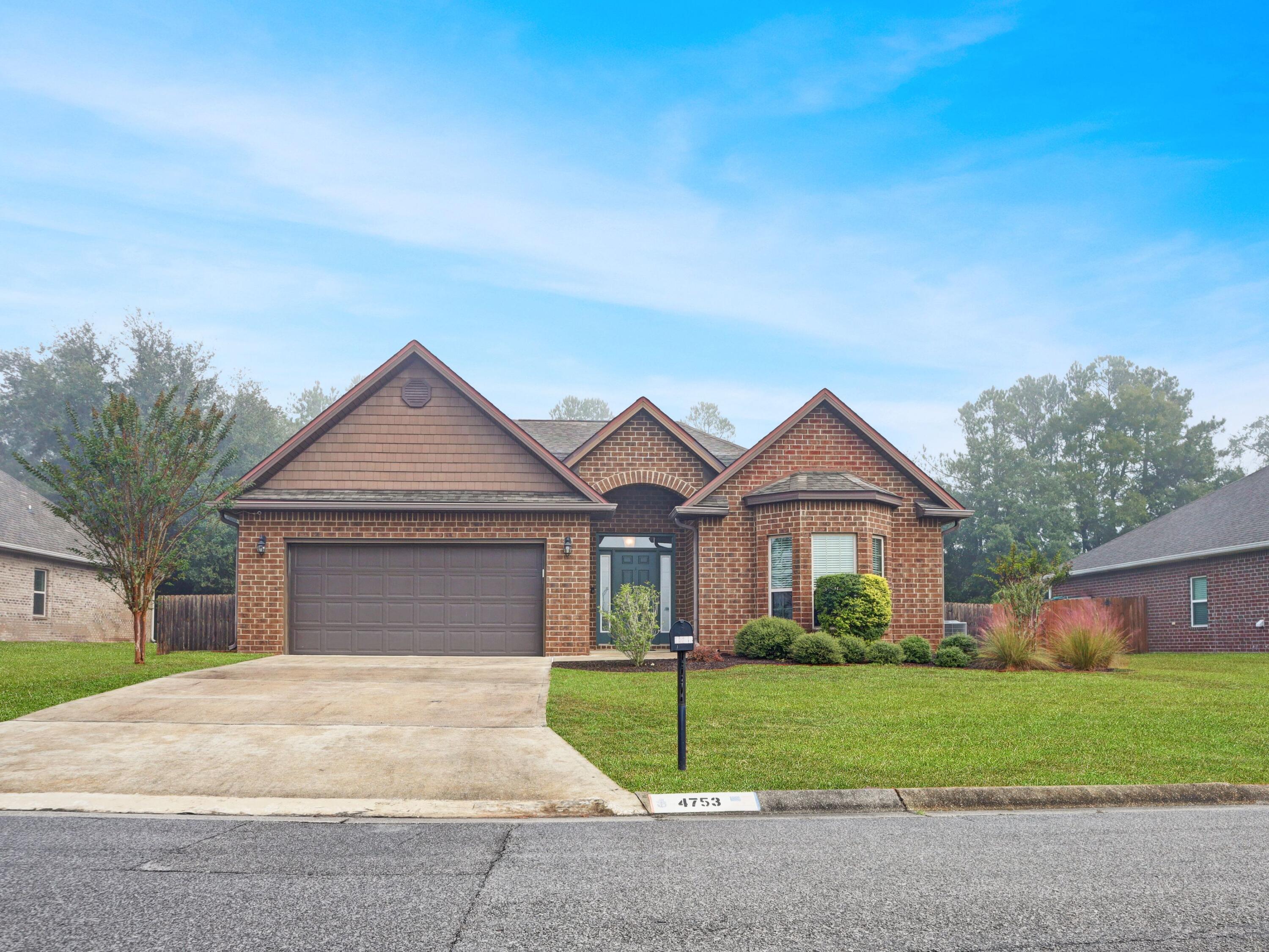 front view of house with a yard