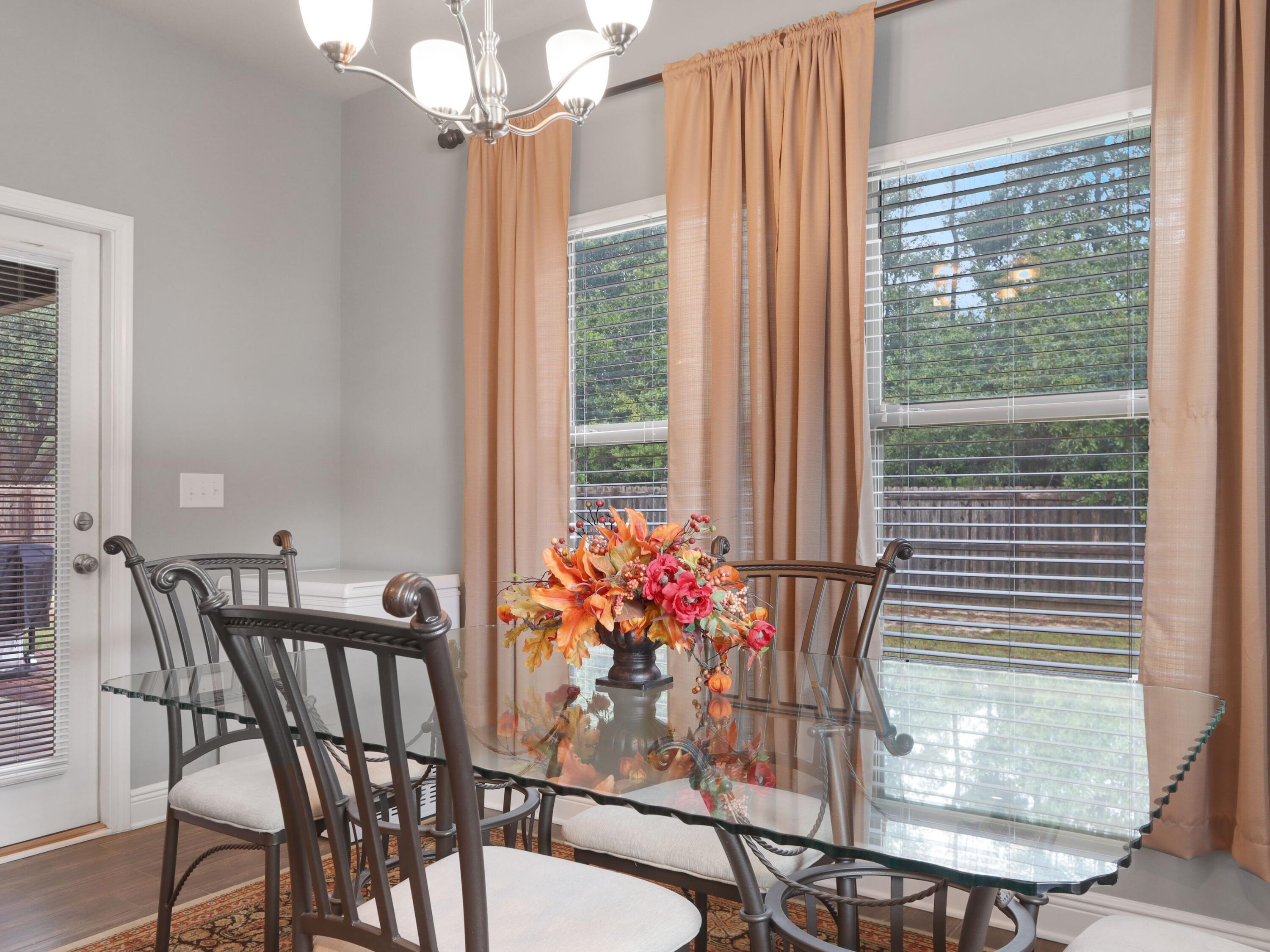 4753 Dupont Circle Pace, FL 32571 - Photo 16 of 42 a dining room with furniture and window