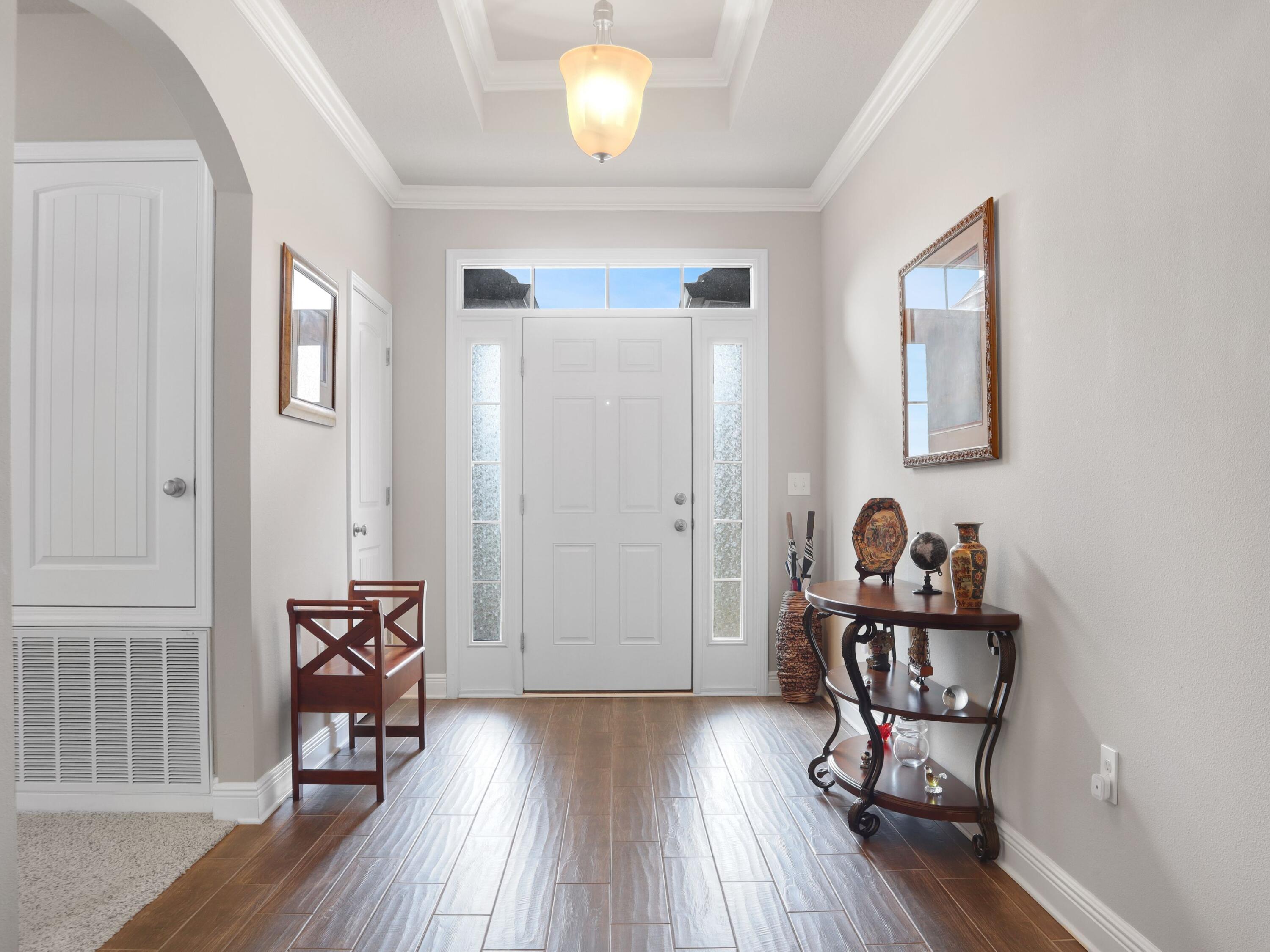 4753 Dupont Circle Pace, FL 32571 - Photo 7 of 42 a view of a room with lounge chair and wooden floor