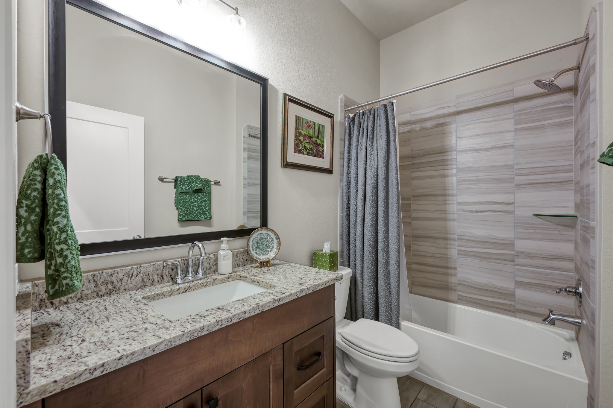111 Yellow Perch Way Conroe, TX 77318 - Photo 16 of 35 Full secondary bathroom with modern finishes.