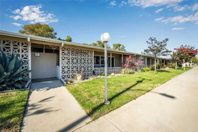 a view of a house with backyard porch and patio