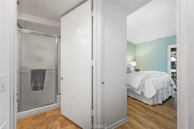 a bedroom with a bed and a table