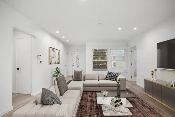 a living room with furniture and a couch