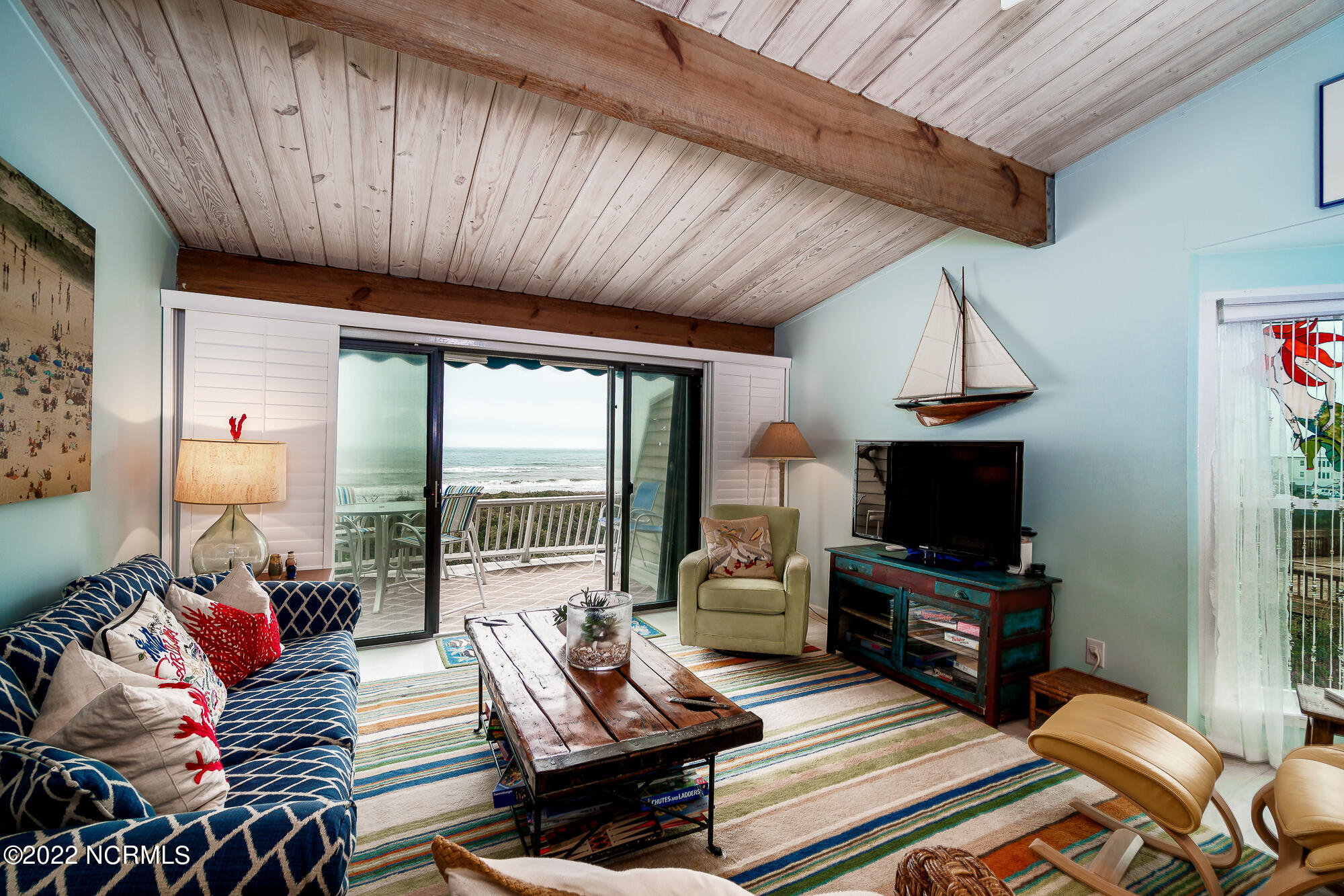 131 Salter Path Road, Unit 1 CORAL BAY WEST Atlantic Beach, NC 28512 - Photo 11 of 77 Open concept living & dining area