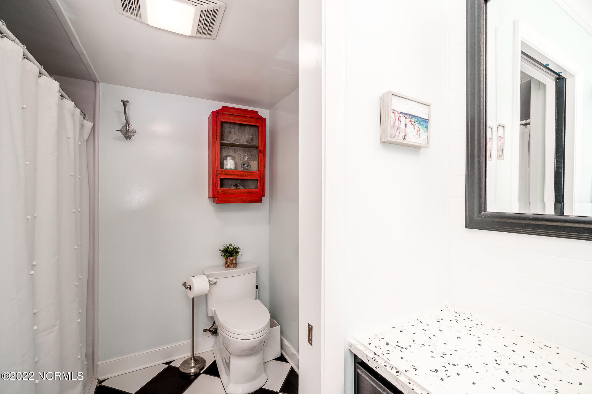 131 Salter Path Road, Unit 1 CORAL BAY WEST Atlantic Beach, NC 28512 - Photo 24 of 77 En suite primary bathroom