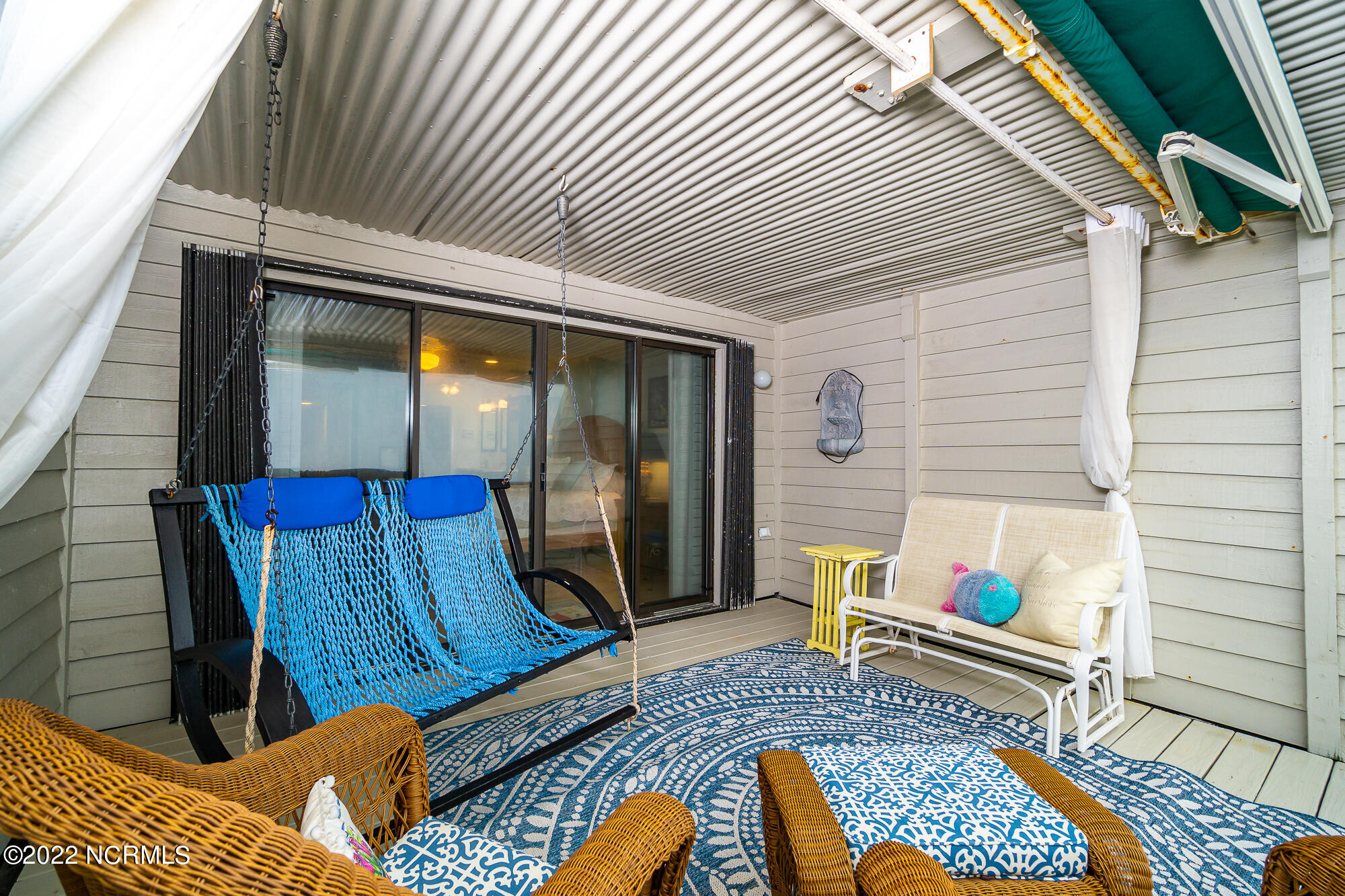 131 Salter Path Road, Unit 1 CORAL BAY WEST Atlantic Beach, NC 28512 - Photo 25 of 77 Private porch off primary suite