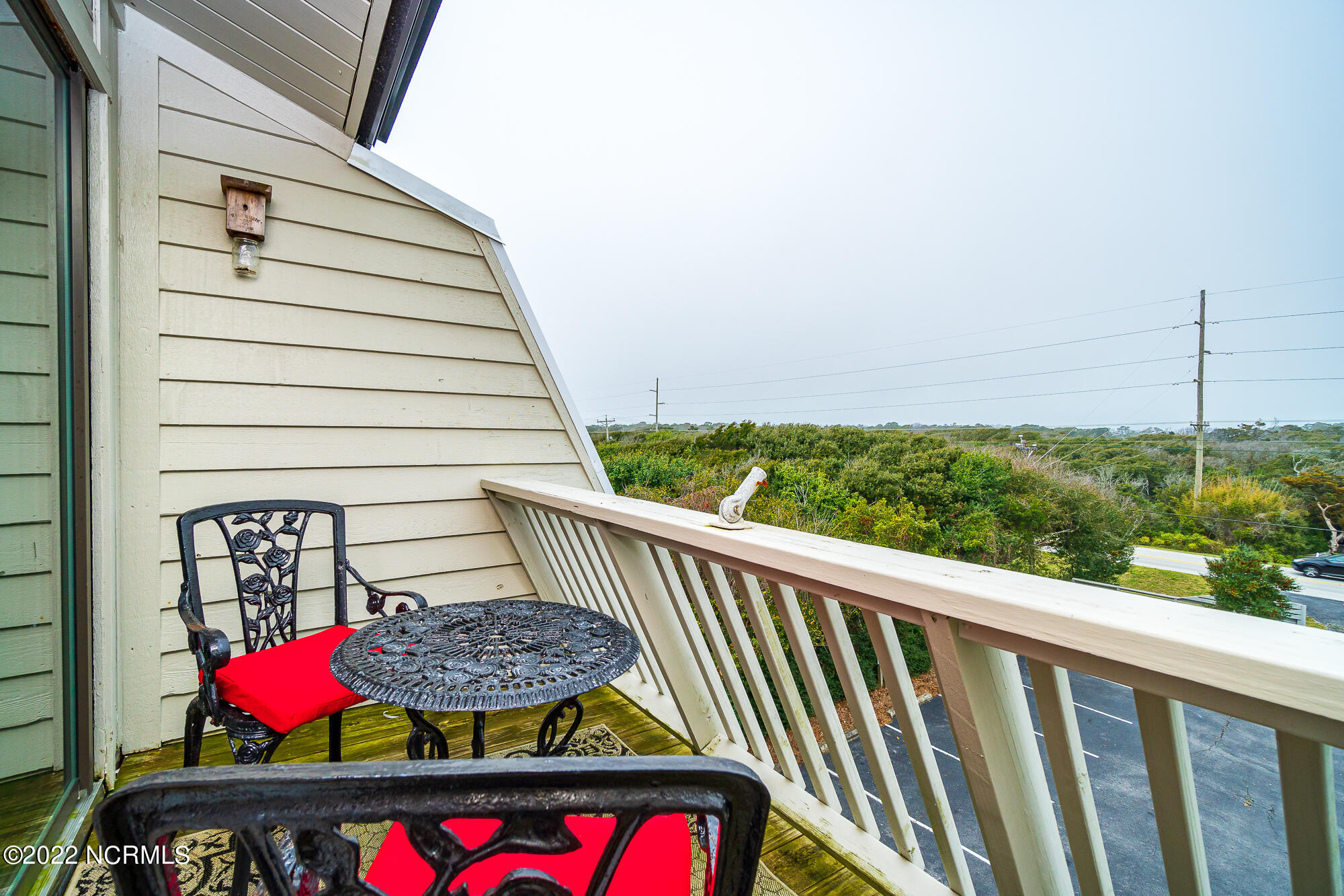 131 Salter Path Road, Unit 1 CORAL BAY WEST Atlantic Beach, NC 28512 - Photo 30 of 77 Private porch off guest room