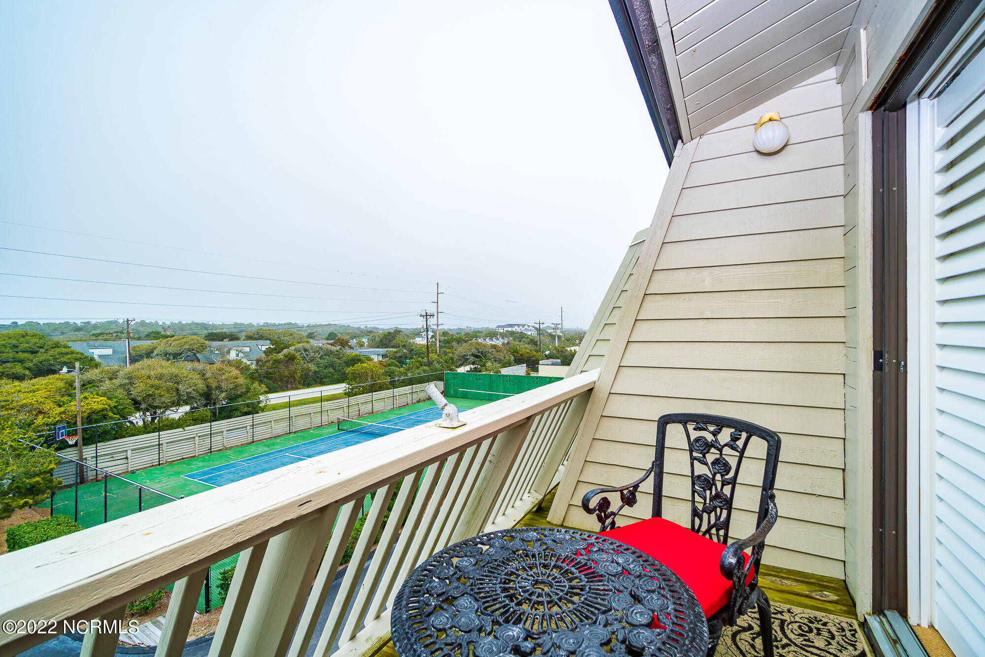 131 Salter Path Road, Unit 1 CORAL BAY WEST Atlantic Beach, NC 28512 - Photo 31 of 77 Private porch off guest room