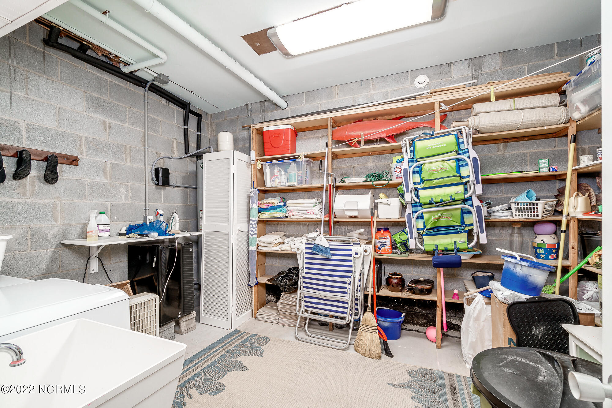 131 Salter Path Road, Unit 1 CORAL BAY WEST Atlantic Beach, NC 28512 - Photo 40 of 77 Laundry/storage room