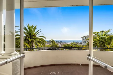 a view of swimming pool with outdoor seating