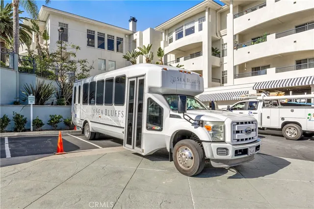 a room with lots of furniture and a large window
