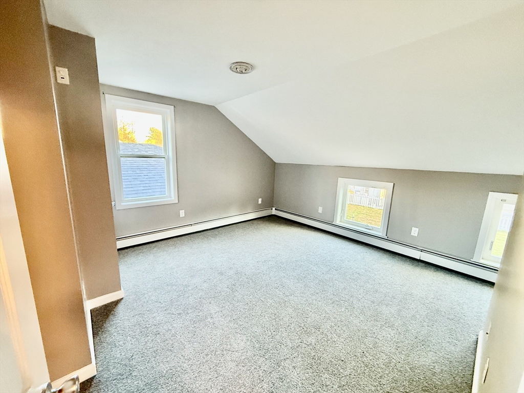 6 Canal Street, Unit B Sutton, MA 01590 - Photo 13 of 15 an empty room with windows