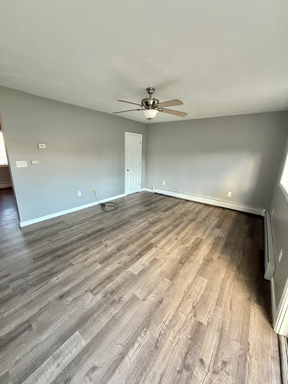 6 Canal Street, Unit B Sutton, MA 01590 - Photo 2 of 15 wooden floor in a room