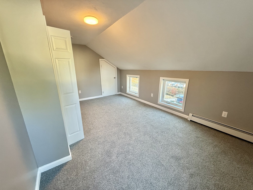 6 Canal Street, Unit B Sutton, MA 01590 - Photo 8 of 15 an empty room with windows