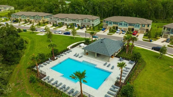 a view of yard with patio