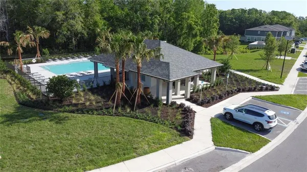 a front view of a house with yard
