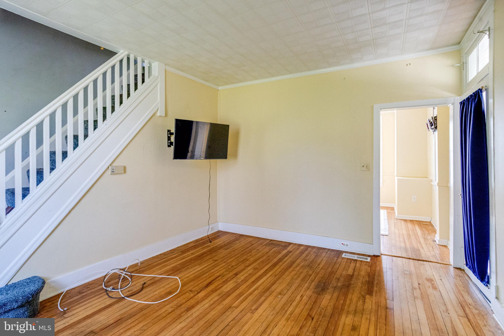 8421 Old Harford Road Parkville, MD 21234 - Photo 12 of 44 a view of a livingroom with wooden floor