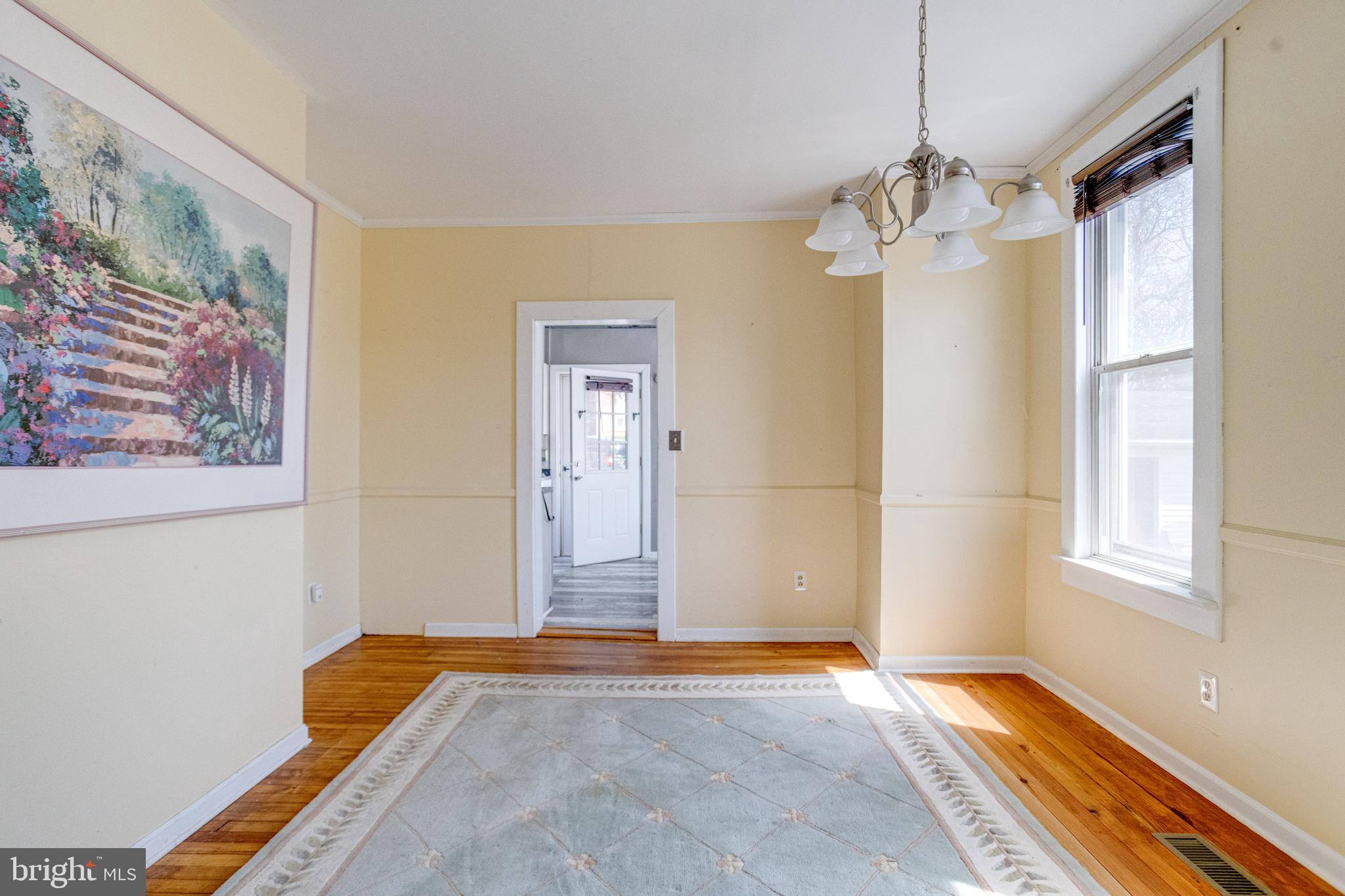 8421 Old Harford Road Parkville, MD 21234 - Photo 14 of 44 a view of an empty room with a window