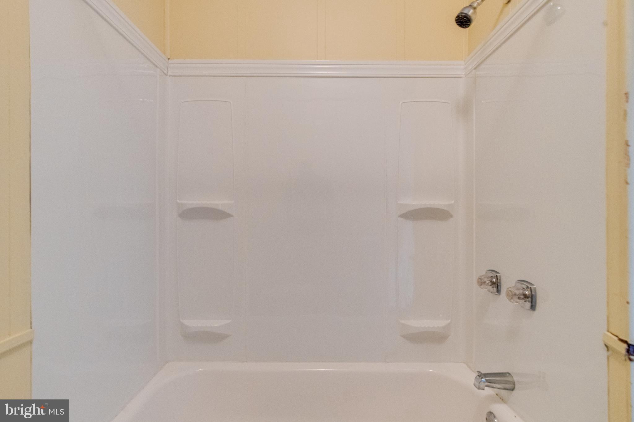 8421 Old Harford Road Parkville, MD 21234 - Photo 20 of 44 a bathroom with a bathtub