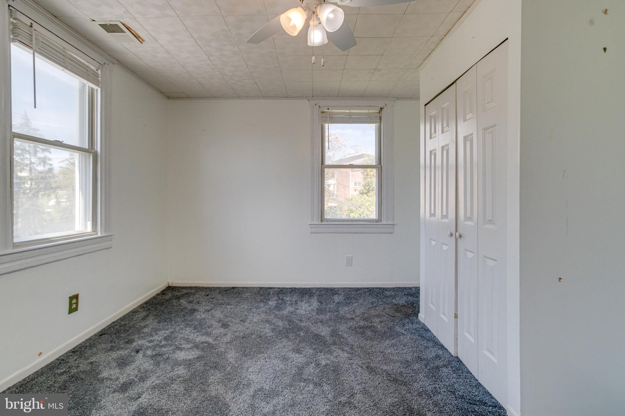 8421 Old Harford Road Parkville, MD 21234 - Photo 30 of 44 a view of an empty room with a window
