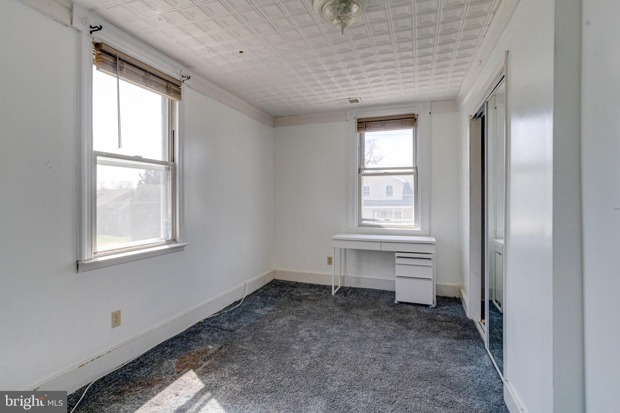 8421 Old Harford Road Parkville, MD 21234 - Photo 33 of 44 an empty room with windows