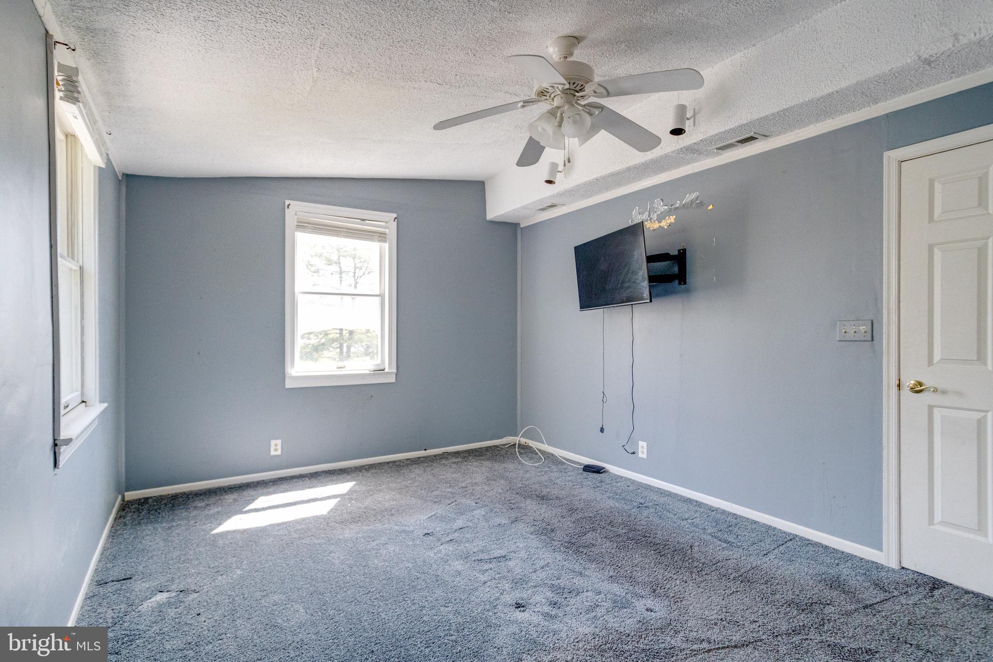 8421 Old Harford Road Parkville, MD 21234 - Photo 37 of 44 a view of a livingroom with a flat screen tv