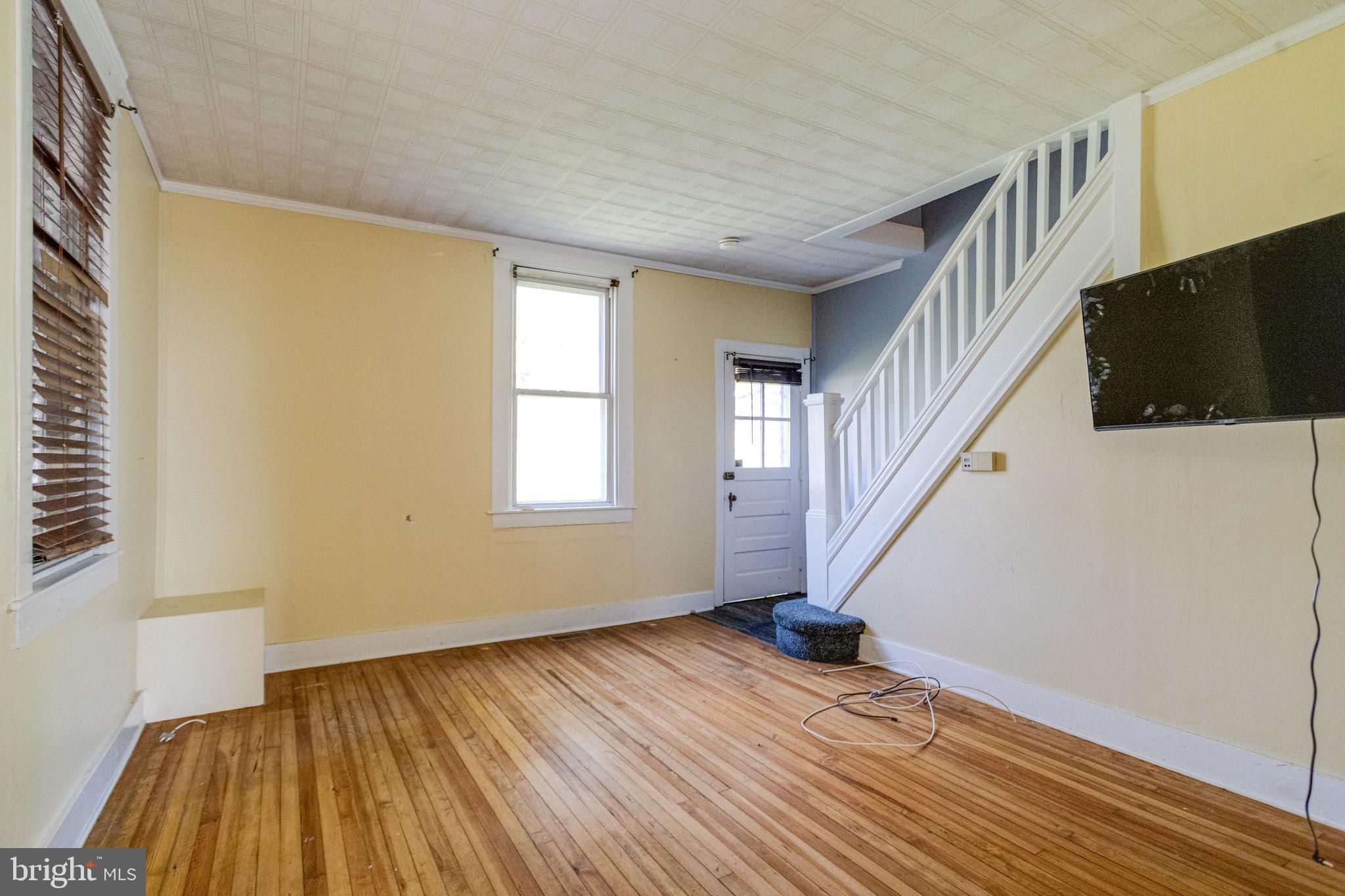 8421 Old Harford Road Parkville, MD 21234 - Photo 8 of 44 a view of entryway with wooden floor and stairs