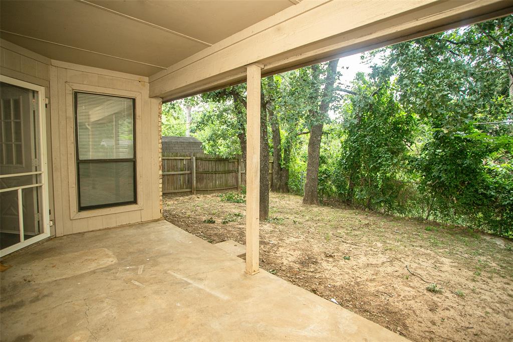 2019 West Nathan Lowe Road Arlington, TX 76017 - Photo 19 of 21 Room featuring wood-finish flooring, a single window with blinds, and a flush-mount ceiling light fixture