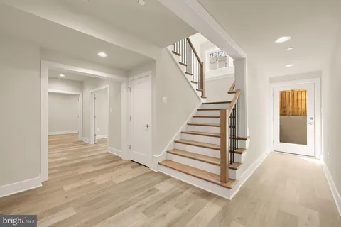 a picture of a bathroom with a shower