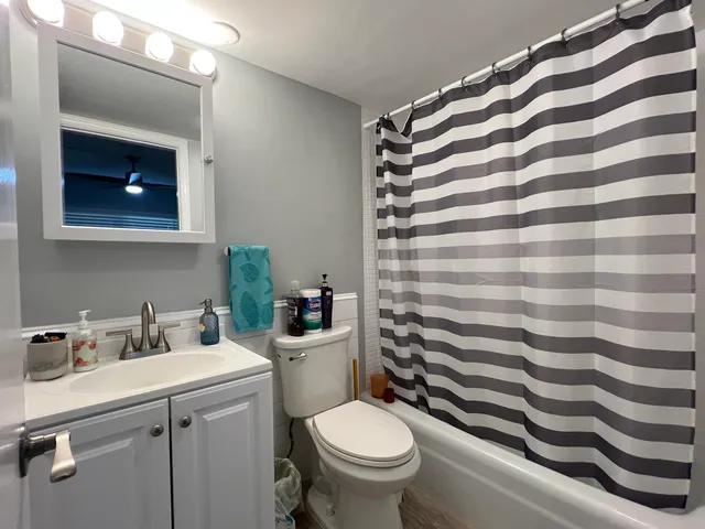 a view of a building next to a yard