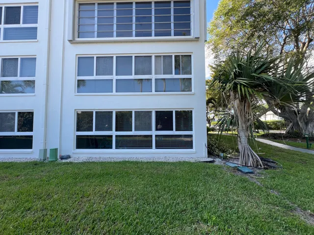 a view of entryway with flower pots