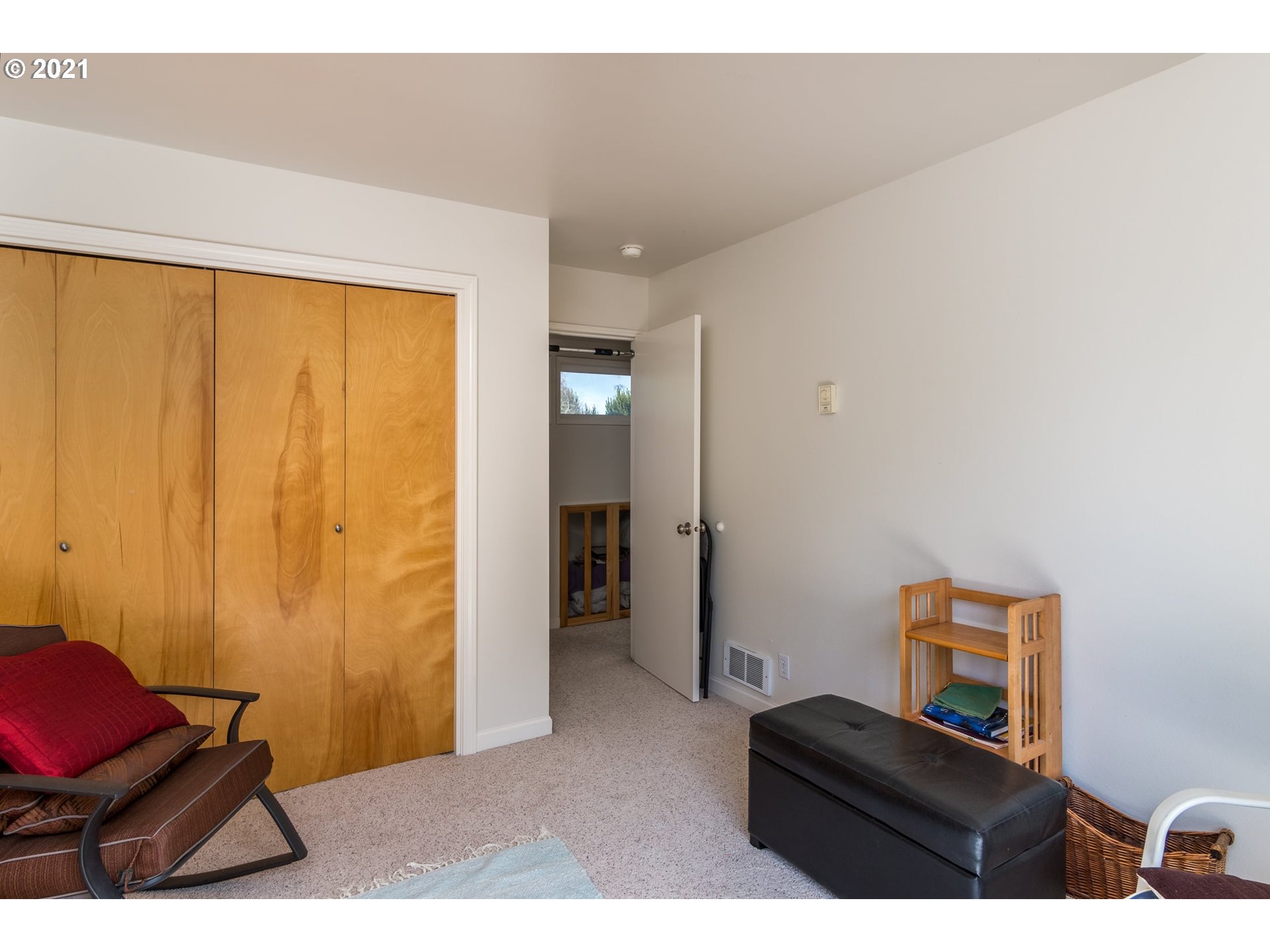 3661 Natalie Way Bandon, OR 97411 - Photo 25 of 32 a living room with furniture and a gate