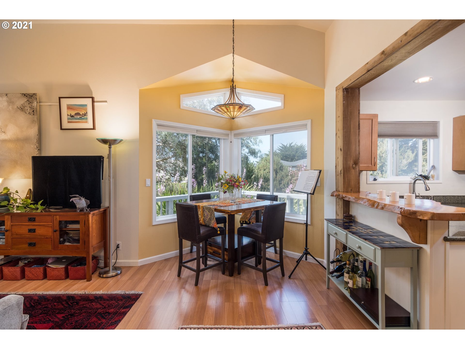 3661 Natalie Way Bandon, OR 97411 - Photo 10 of 32 a view of a dining room with furniture window and outside view