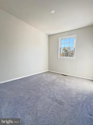 a view of an empty room with window